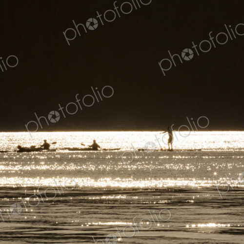 Paddlers, paddleboarders on the water at Deception Pass State Park, Anacortes.