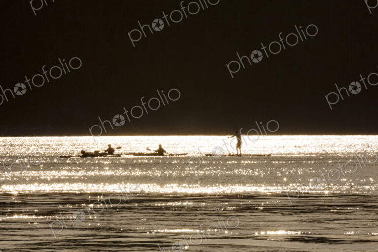 Paddlers, paddleboarders on the water at Deception Pass State Park, Anacortes.