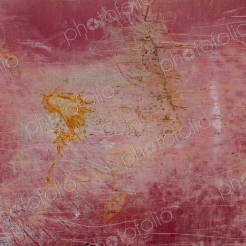 Painted red metal with rust and scratch markings Painted red metal with rust and scratch markings