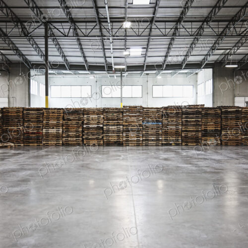 Pallets stacked in warehouse Pallets stacked in warehouse