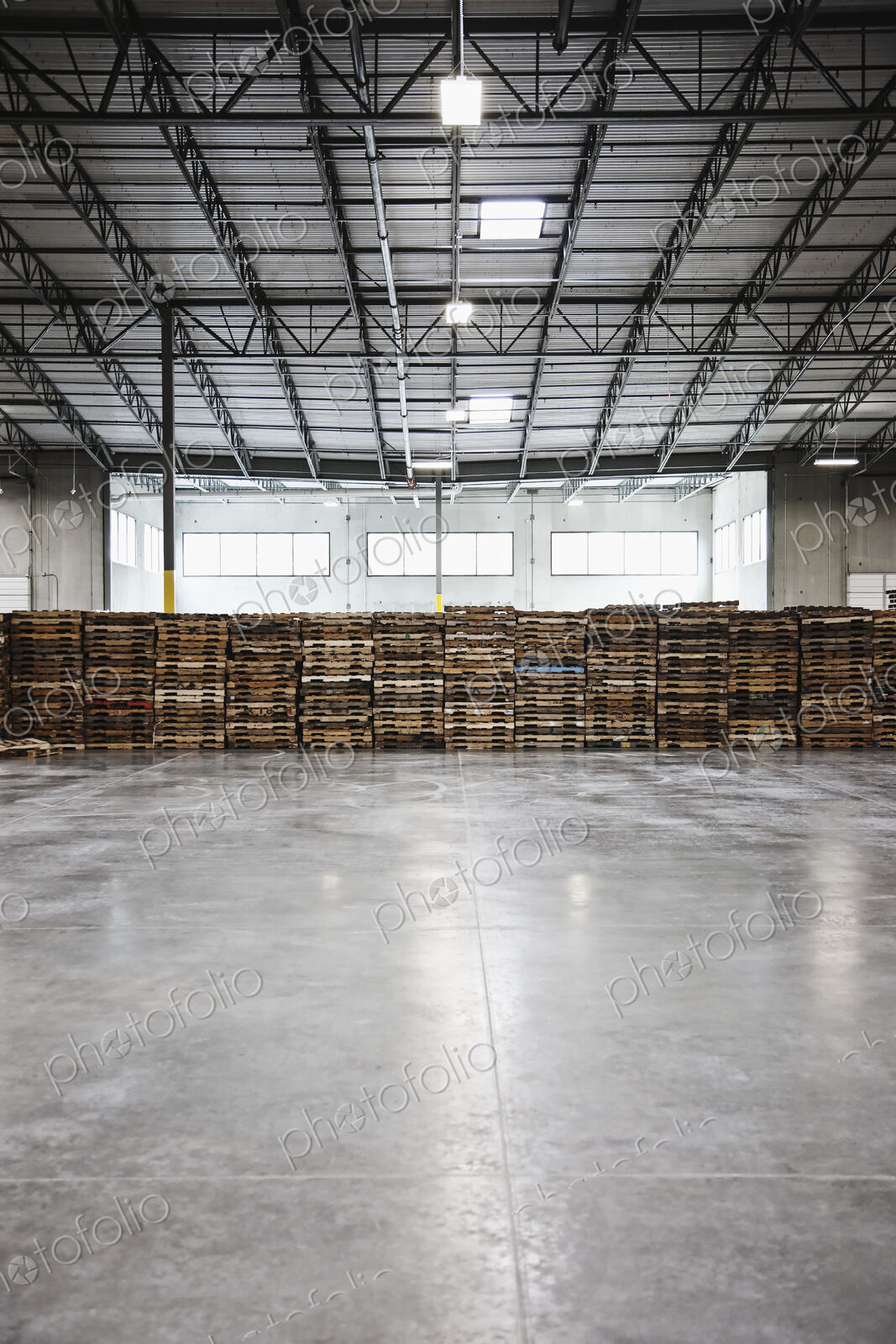Pallets stacked in warehouse