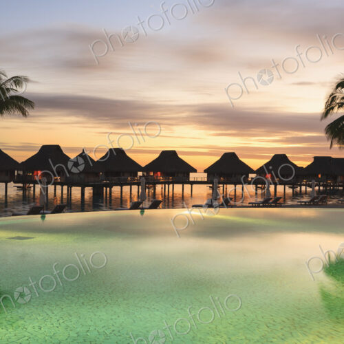 Palm trees and tropical resort, Bora Bora, French Polynesia Palm trees and tropical resort, Bora Bora, French Polynesia