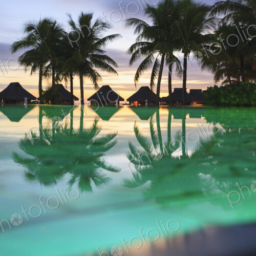 Palm trees and tropical resort, Bora Bora, French Polynesia Palm trees and tropical resort, Bora Bora, French Polynesia