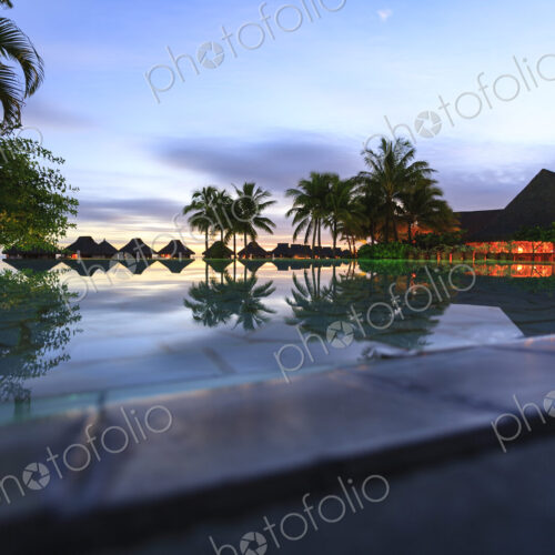 Palm trees and tropical resort, Bora Bora, French Polynesia Palm trees and tropical resort, Bora Bora, French Polynesia