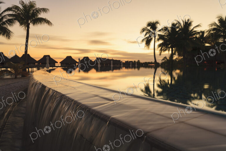 Palm trees overlooking tropical resort, Bora Bora, French Polynesia
