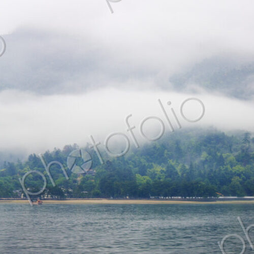 Panoramic View of Landscape Across a Lake Panoramic View of Landscape Across a Lake