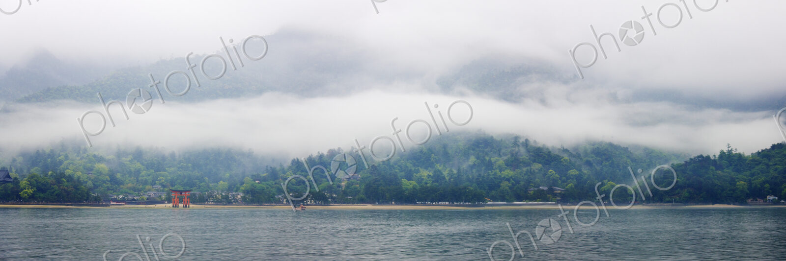 Panoramic View of Landscape Across a Lake