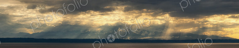 Panoramic view of Olympic Mountain range seen from across the water, Washington state,…