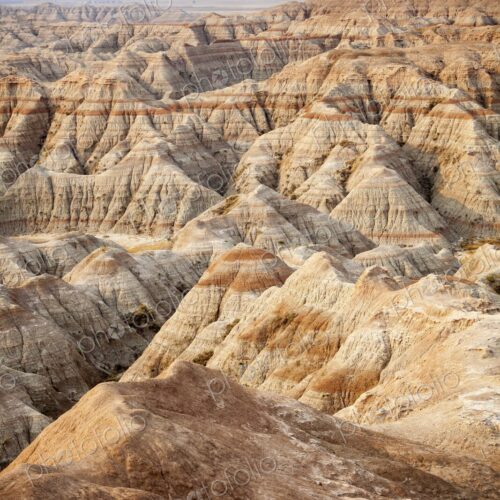 Panoramic view of striped buttes and eroded hills at a scenic overlook in Badlands… Panoramic view of striped buttes and eroded hills at a scenic overlook in Badlands…