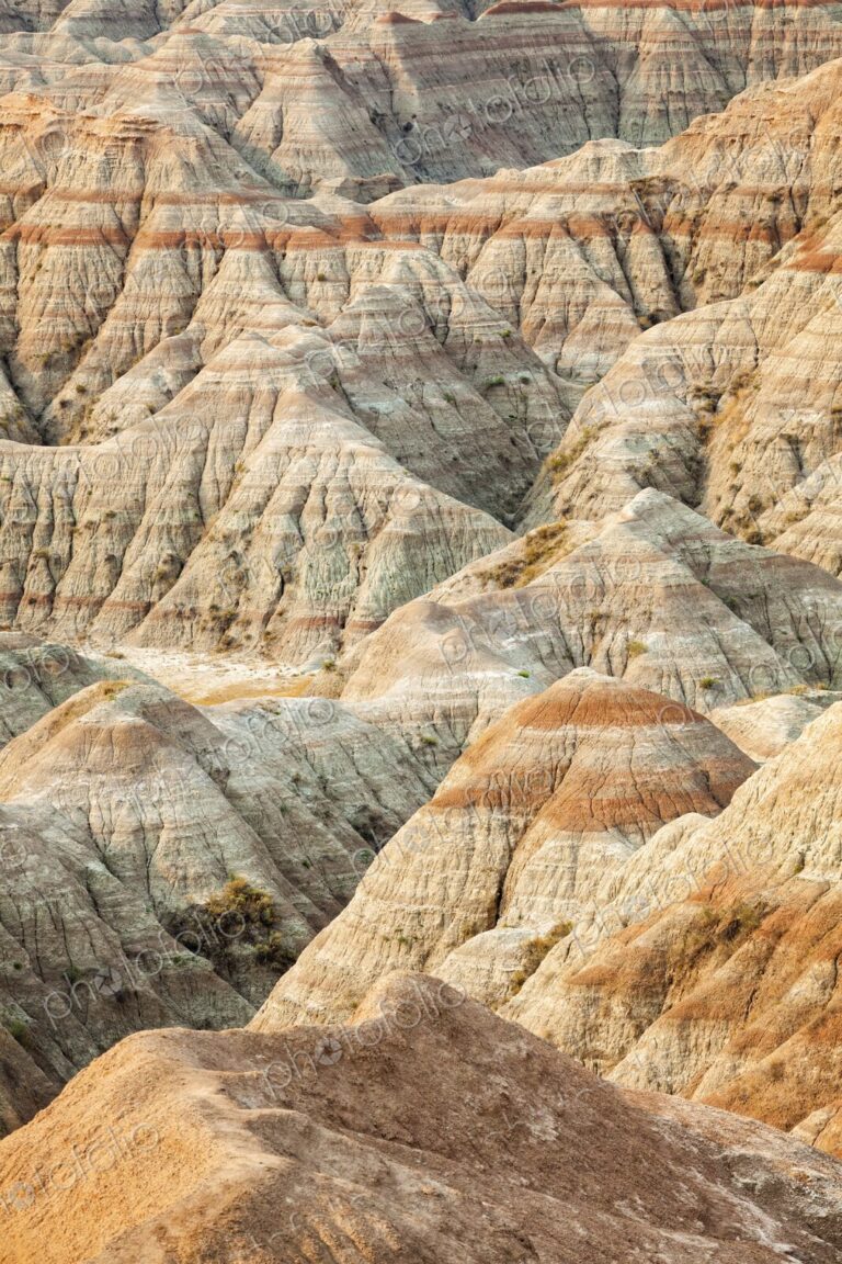 Panoramic view of striped buttes and eroded hills at a scenic overlook in Badlands…