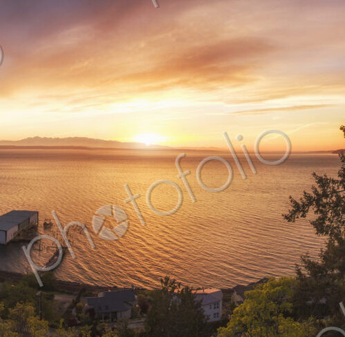 Panoramic view of sunset over lake in remote landscape