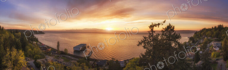 Panoramic view of sunset over lake in remote landscape