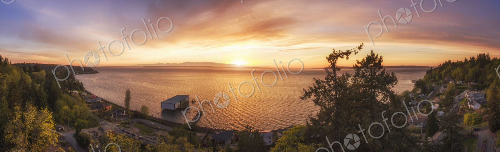 Panoramic view of sunset over lake in remote landscape