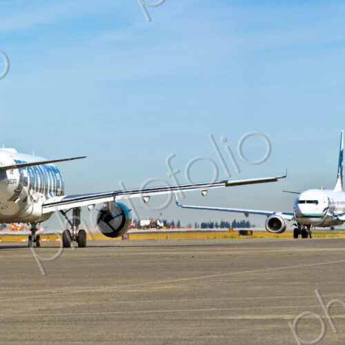 Passenger Jets on a Runway Passenger Jets on a Runway