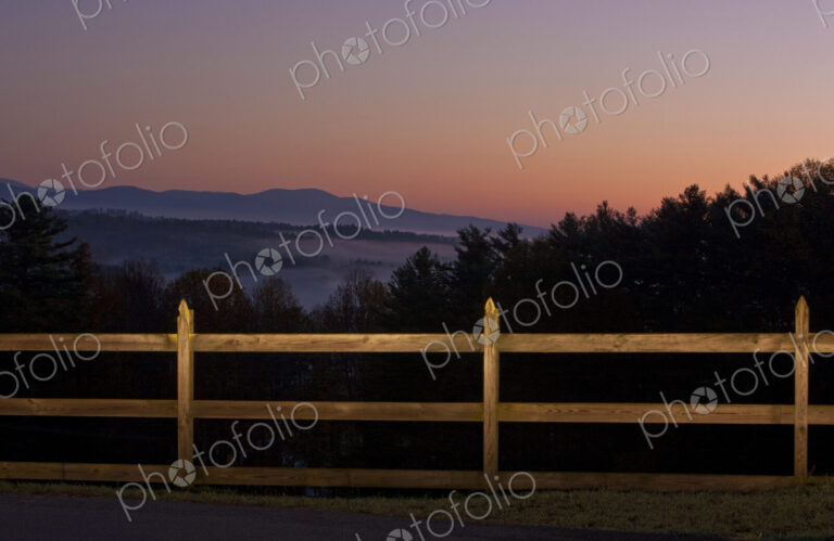 Pasture Fence in Mountains at Twilight