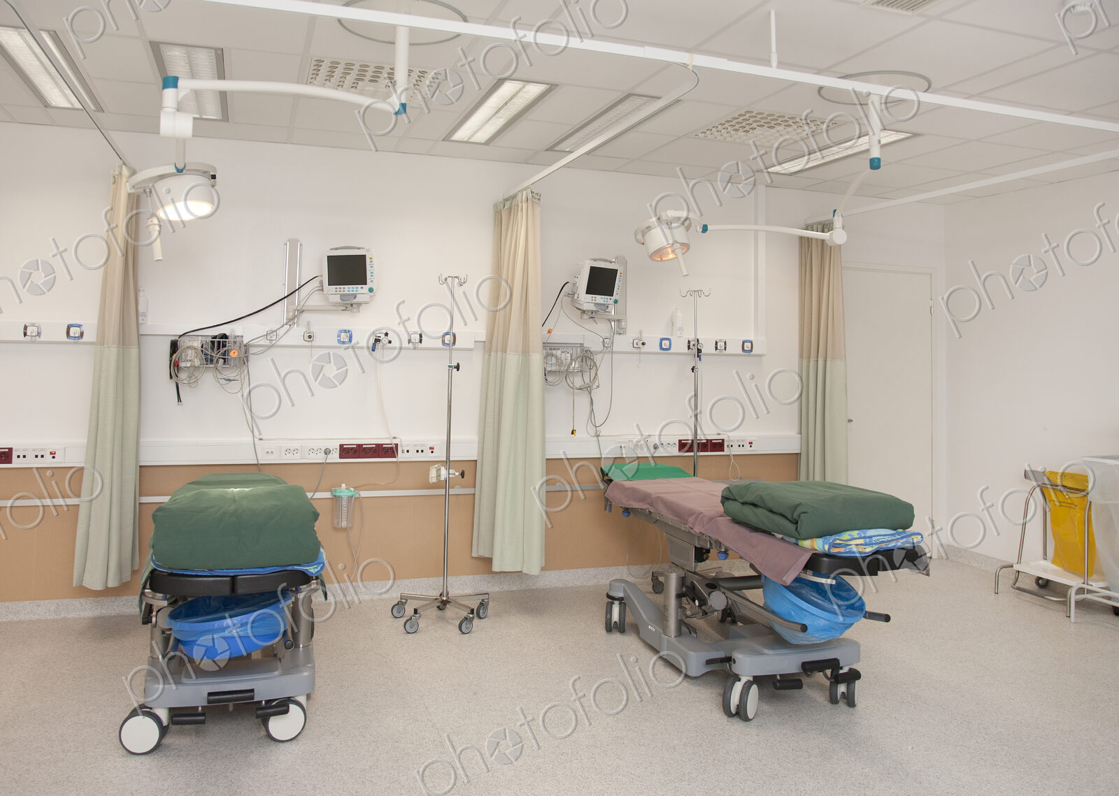 Patient faciities in a modern hospital, beds and patient bays, electronic equipment…