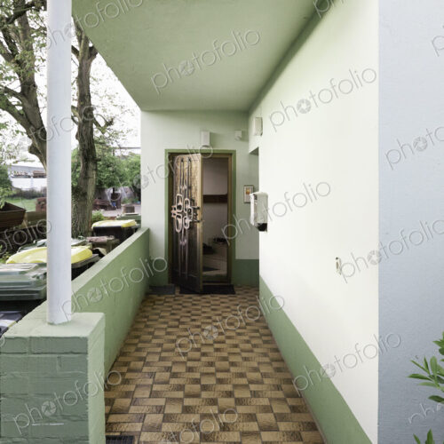 Patio walkway and doorway of retro home Patio walkway and doorway of retro home