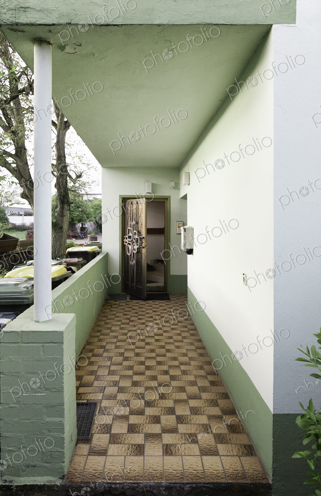 Patio walkway and doorway of retro home