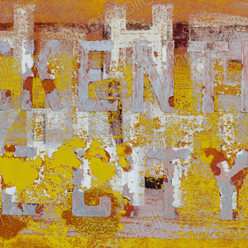 Peeling lettering and paint on side of old, abandoned truck Peeling lettering and paint on side of old, abandoned truck