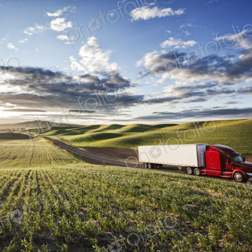 Peterbilt Class8 commercial truck driving through farmlands in eastern Washsington,…