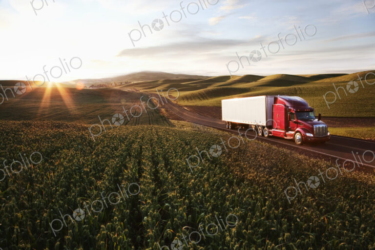 Peterbilt Class8 commercial truck driving through farmlands in eastern Washsington,…