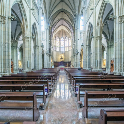 Pews and arches in ornate church Pews and arches in ornate church