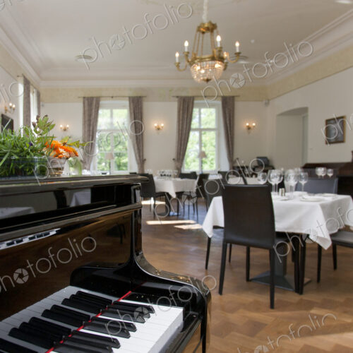 Piano in a Upscale Dining Room Piano in a Upscale Dining Room