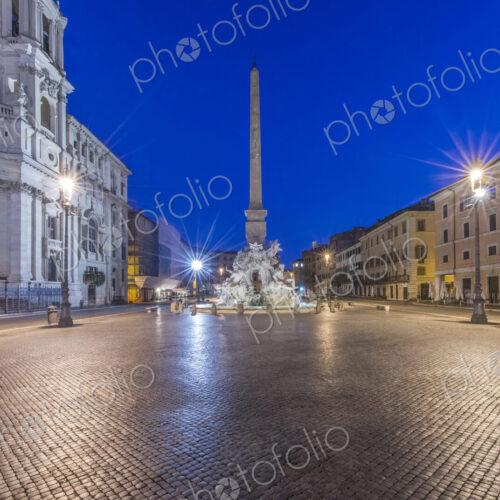 Piazza Navona and Four Rivers Fountain illuminated at night, Rome, Italy