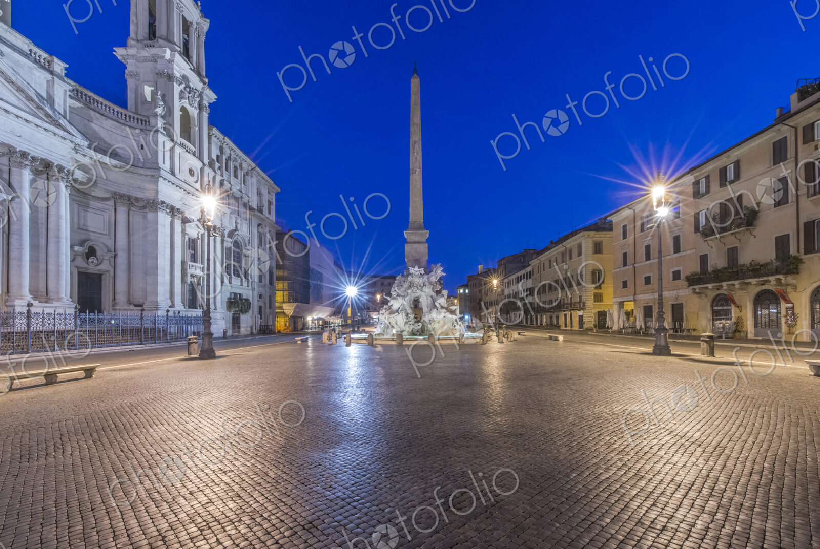 Piazza Navona and Four Rivers Fountain illuminated at night, Rome, Italy