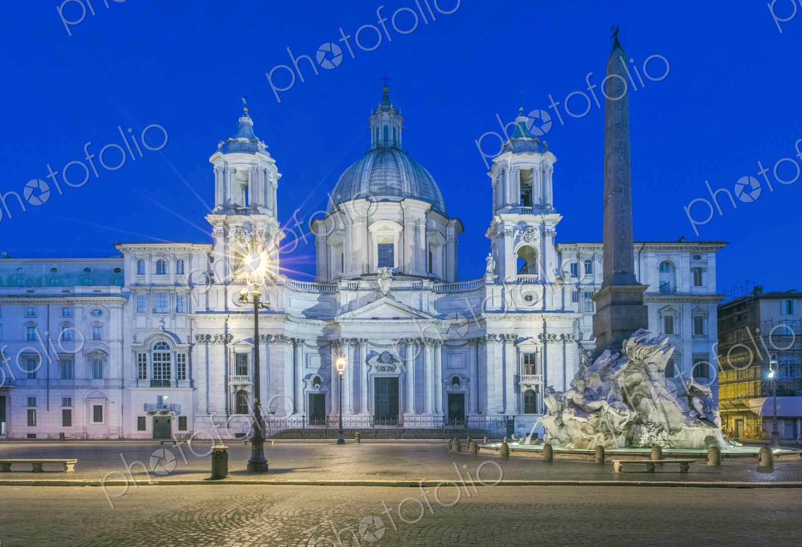 Piazza Navona and Four Rivers Fountain illuminated at night, Rome, Italy