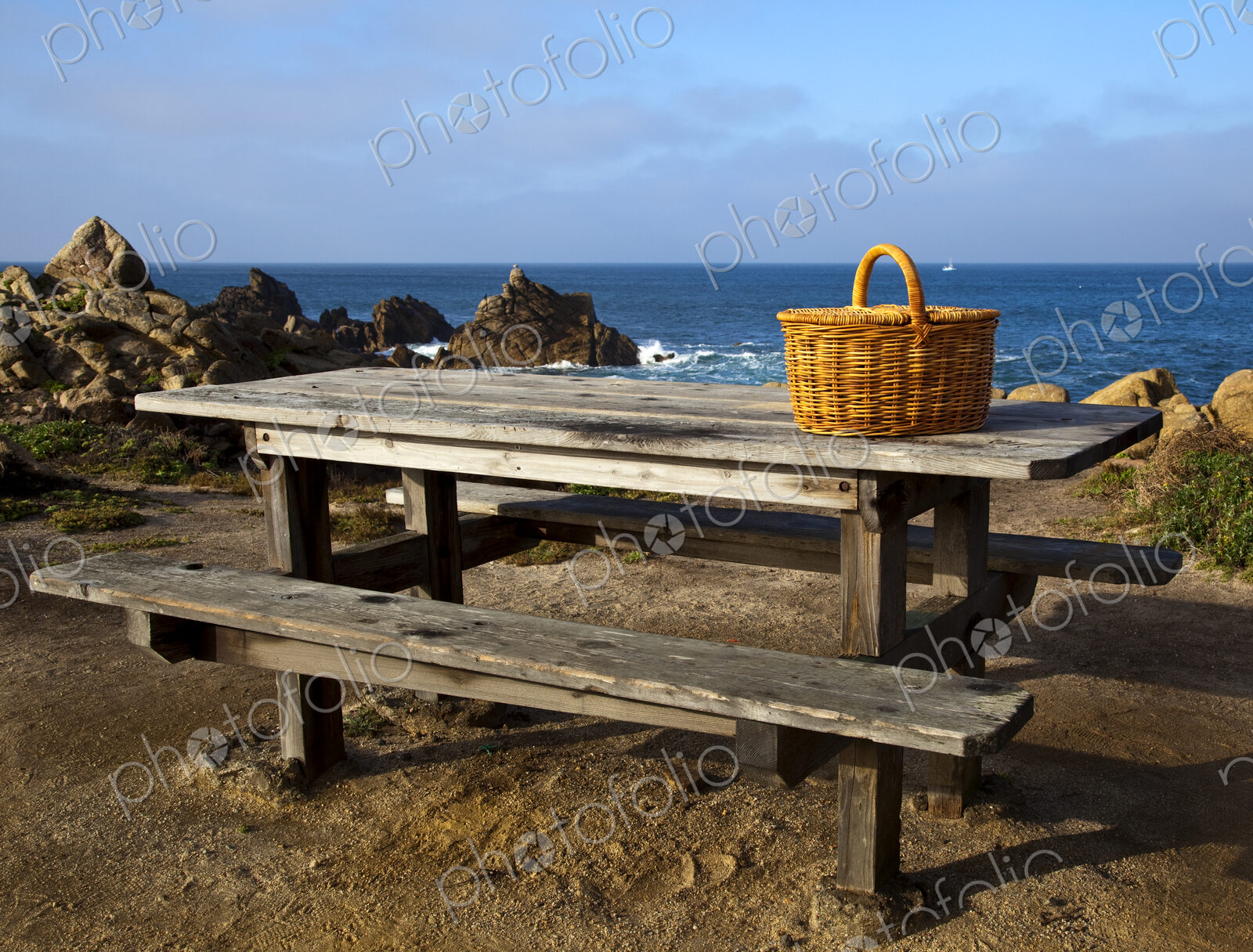 Picnic Basket on Wooden Picnic Table
