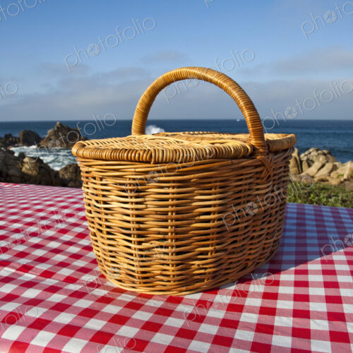 Picnic Basket on Wooden Picnic Table