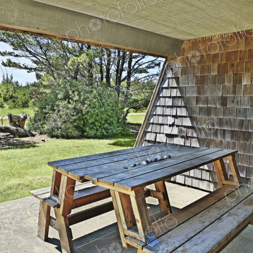 Picnic table in backyard of modern house Picnic table in backyard of modern house