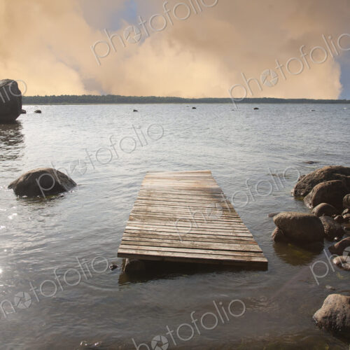 Pier Floating on a Rocky Shore Pier Floating on a Rocky Shore