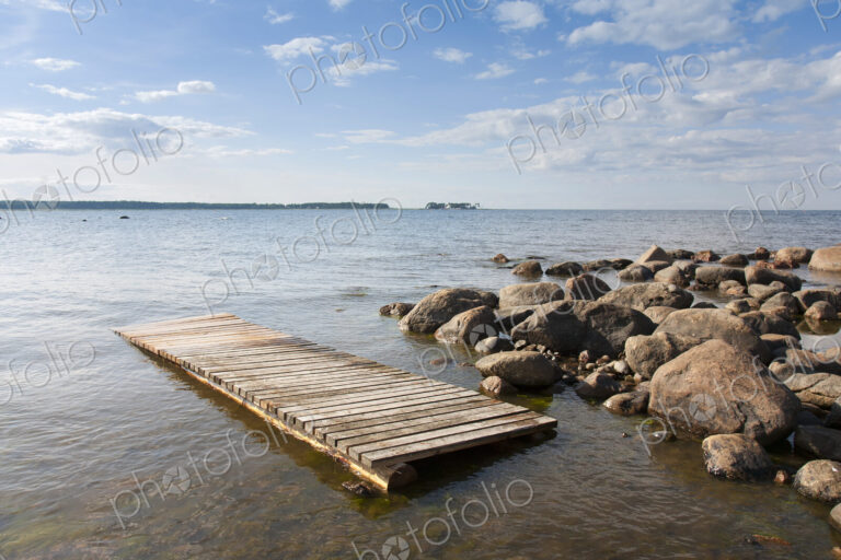 Pier Floating on a Rocky Shore