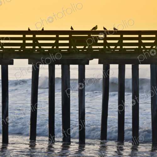 Pier by the Ocean at Sunrise Pier by the Ocean at Sunrise