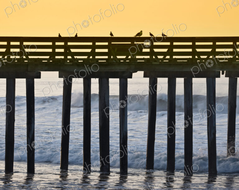 Pier by the Ocean at Sunrise