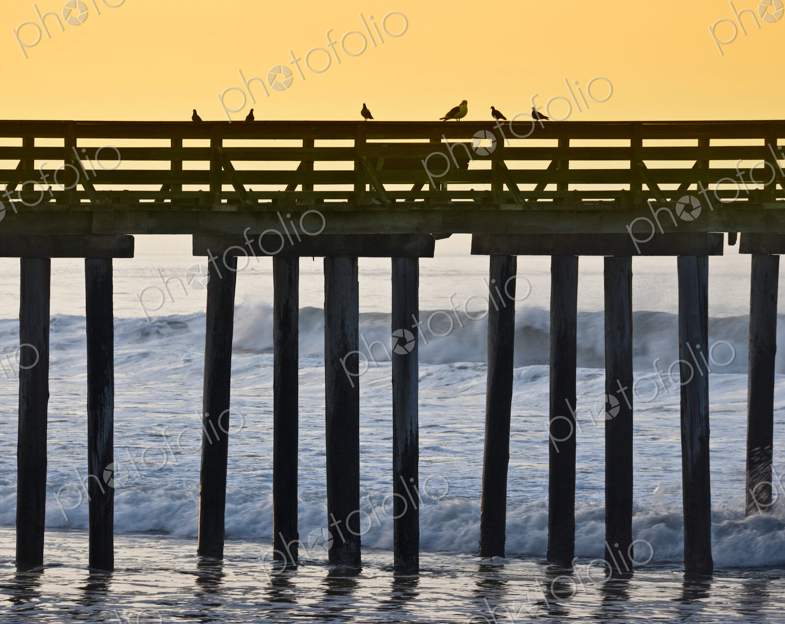 Pier by the Ocean at Sunrise