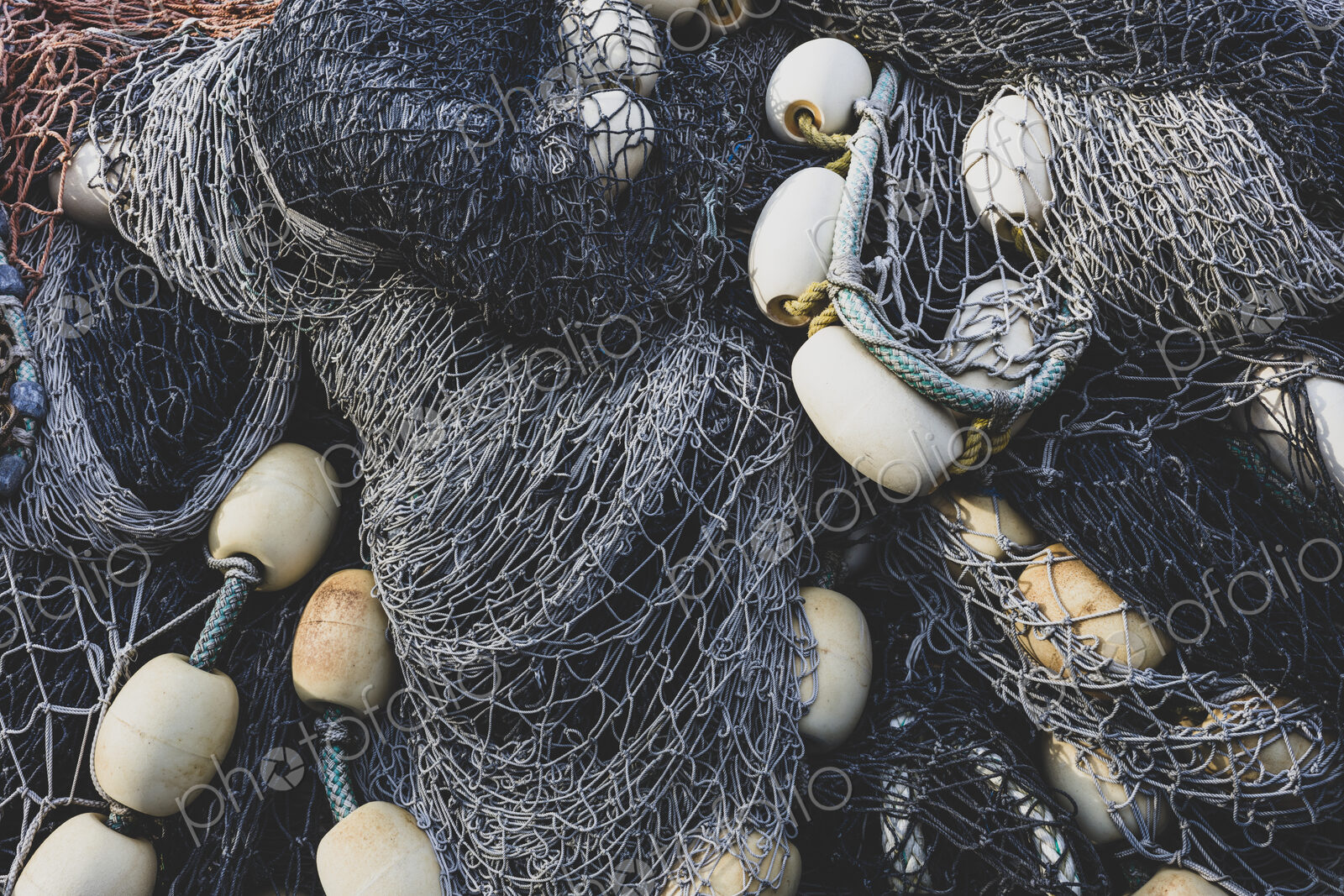 Pile commercial fish nets and gill nets, Fishermen’s Terminal, Seattle, Washington