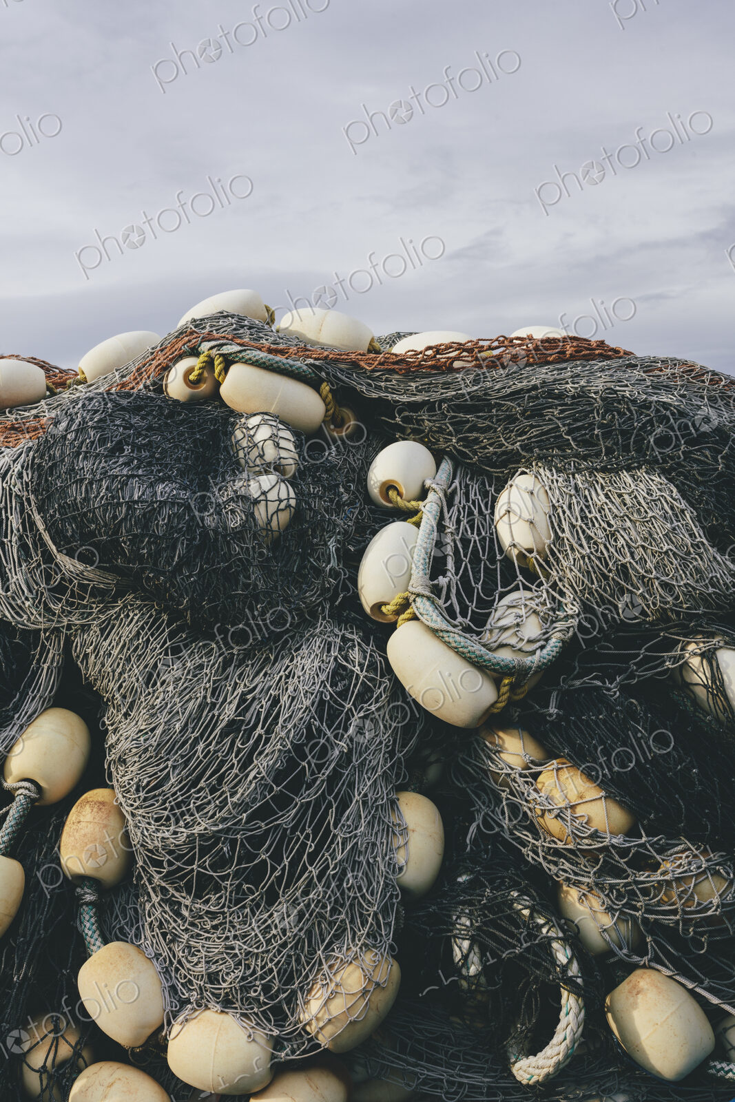 Pile commercial fish nets and gill nets, Fishermen’s Terminal, Seattle, Washington