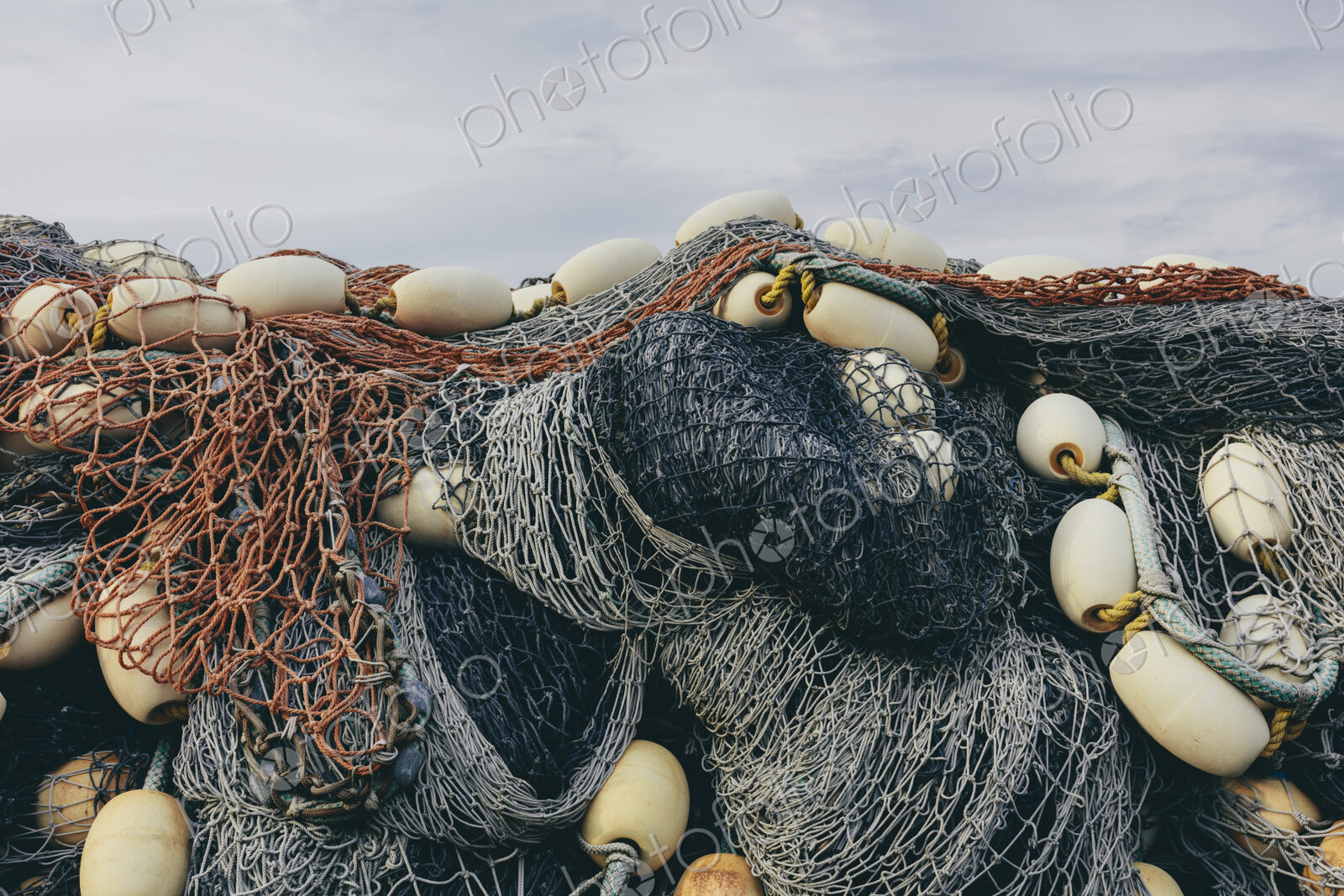Pile commercial fish nets and gill nets, Fishermen’s Terminal, Seattle, Washington