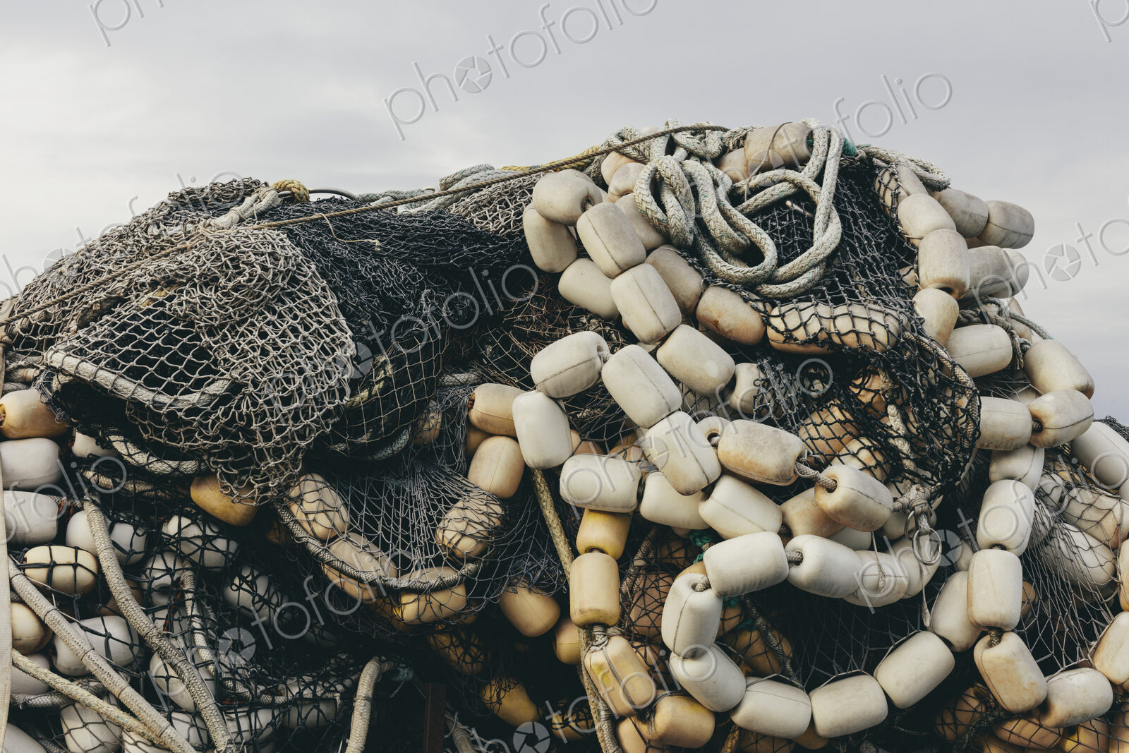 Pile commercial fish nets and gill nets, Fishermen’s Terminal, Seattle, Washington