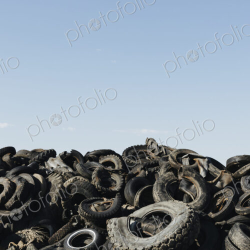 Pile of discarded auto and tractor tires in rural landfil, near Kildeer, Saskatchewan,… Pile of discarded auto and tractor tires in rural landfil, near Kildeer, Saskatchewan,…