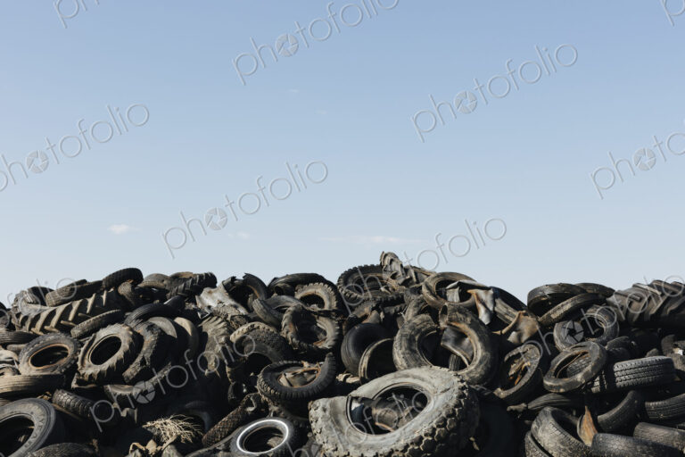 Pile of discarded auto and tractor tires in rural landfil, near Kildeer, Saskatchewan,…