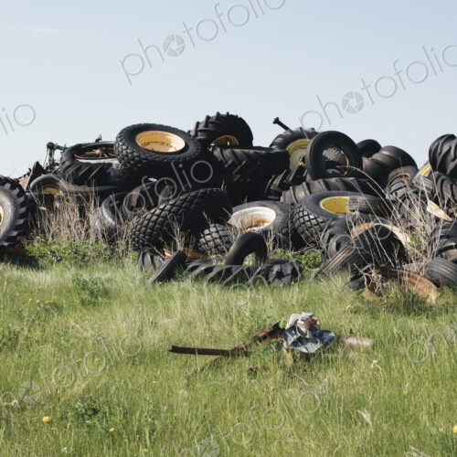 Pile of discarded auto and tractor tires in rural landfill, near Kildeer,…