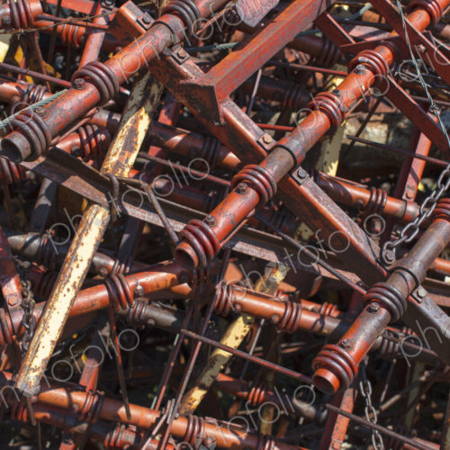 Pile of discarded farming equipment in rural landfill, near Kildeer, Saskatchewan, Canada. Pile of discarded farming equipment in rural landfill, near Kildeer, Saskatchewan, Canada.