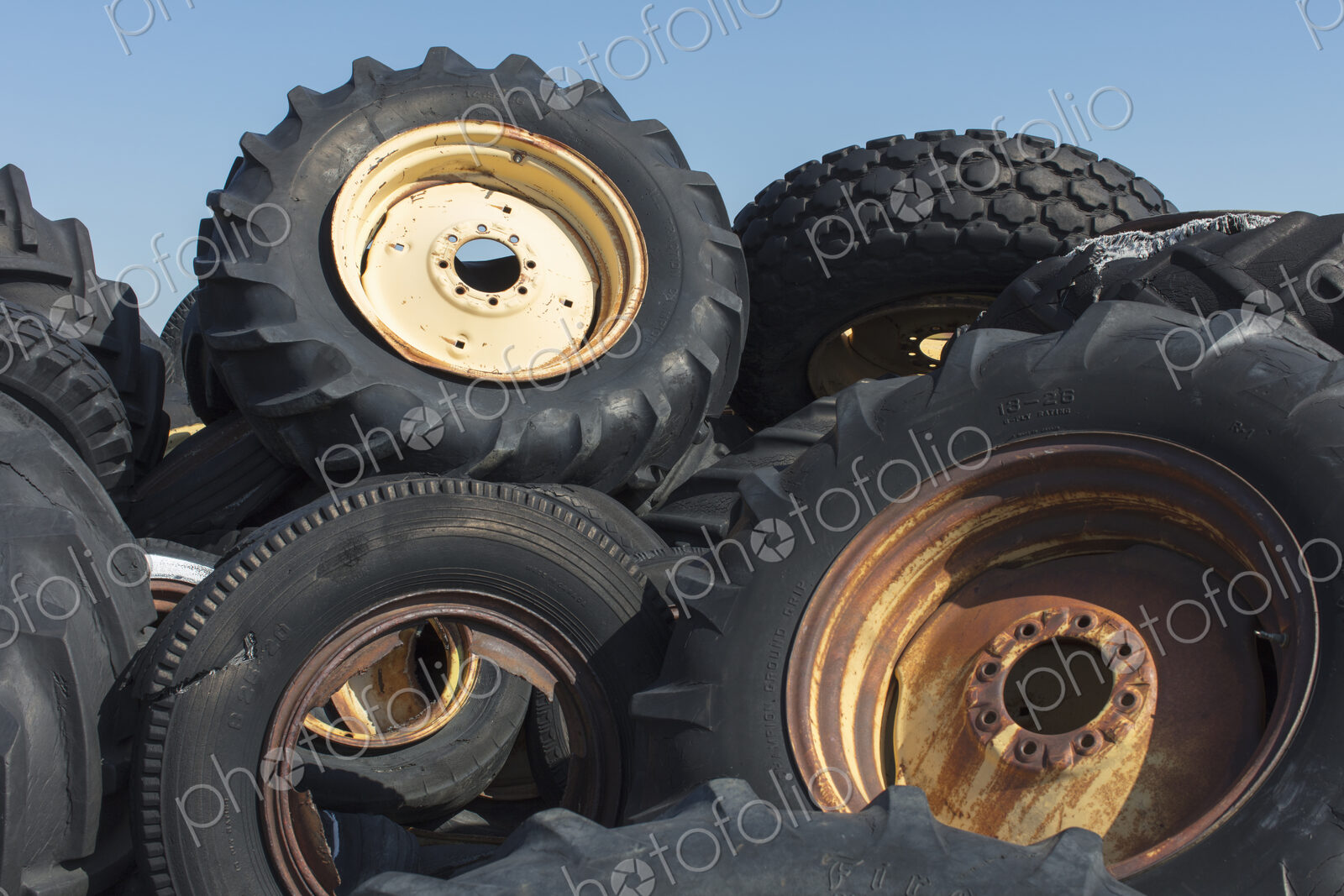 Pile of discarded farming equipment in rural landfill, near Kildeer, Saskatchewan, Canada.