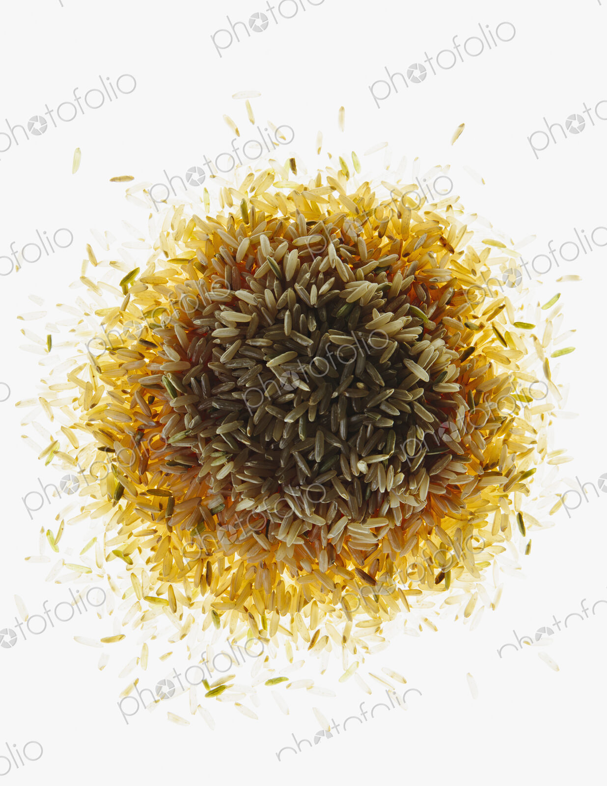 Pile of organic long grain brown rice, white background