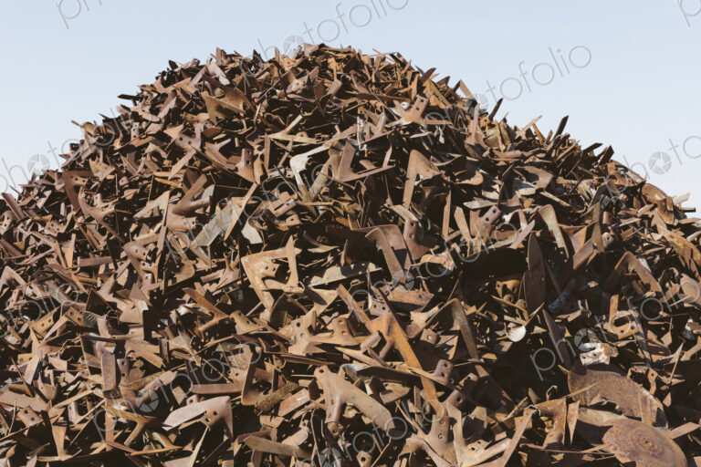 Pile of rusty metal used for railroad construction, near Kildeer, Saskatchewan, Canada.
