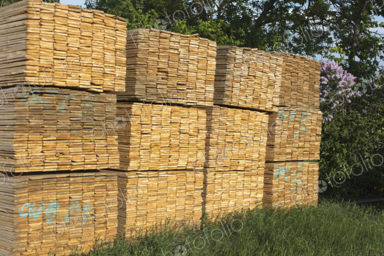 Piles of cut lumber, Eastend, Saskatchewan, Canada.